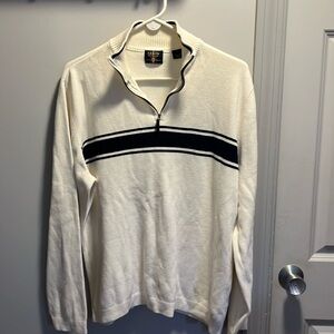 Gently worn sweater with short zip front and accents on front